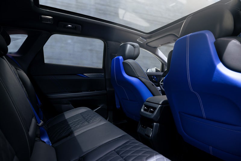 Back Seat View of the 2026 OPTIQ-V Blue Front Seats, Sun Roof, and Interior | Scott Cadillac in Allentown PA