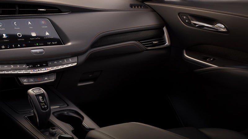 A car's interior displaying plush leather seats