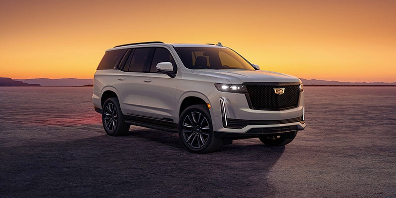 The 2024 Cadillac Escalade displayed prominently.